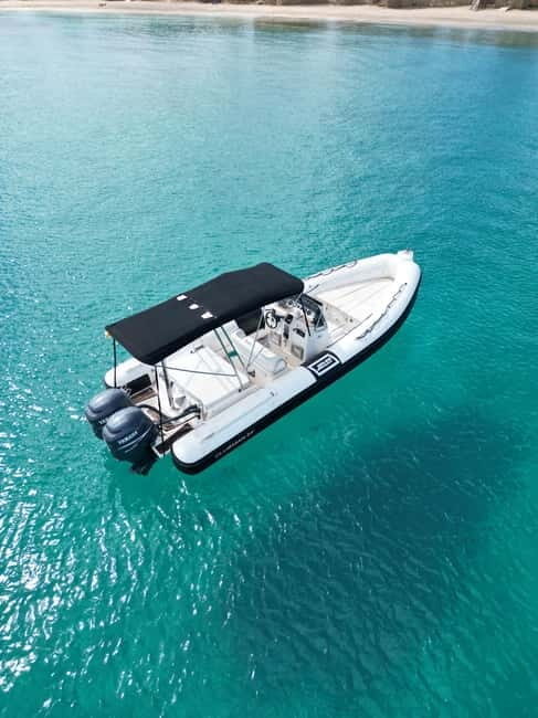 San Antonio: Private Boat Experience with Paddle Surfing and Snorkeling - Key Points