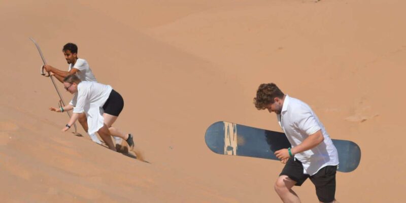 Sandboarding & Sunset Camel Ride With Barbecue - Scenic Countryside Exploration