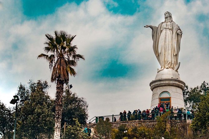 Santiago Like a Local: Private Walking Tour With Coffee, Markets, Street Food and San Cristobal Hill - Metro Rides and Murals