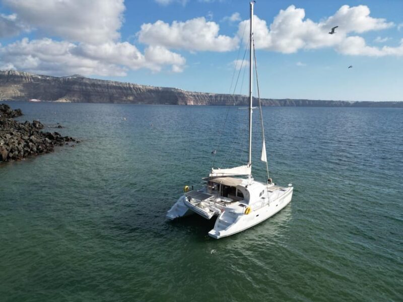 Santorini: Catamaran Cruise with Greek BBQ and Drinks - Key Points