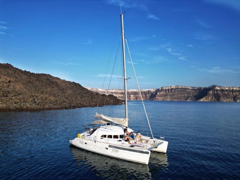 Santorini: Catamaran Cruise with Greek BBQ and Drinks - The Sum Up
