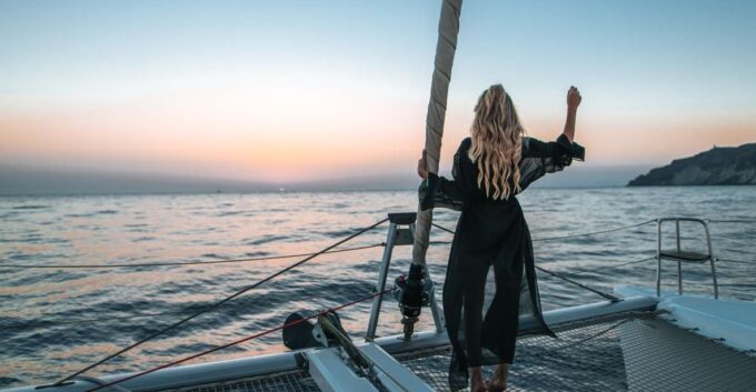 Santorini Catamaran Cruise With Swimming, Meal and Open Bar - Frequently Asked Questions