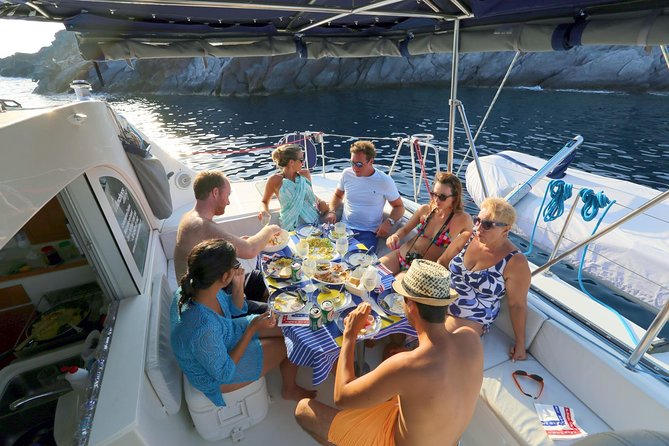 Santorini Full Day Catamaran Private Cruise Incl. Meal, Drinks & Free Transport - Enjoy Guided Sightseeing Tour