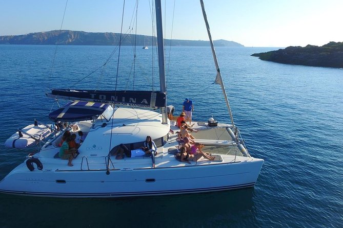 Santorini Full Day Catamaran Private Cruise Incl. Meal, Drinks & Free Transport - Convenient Hotel Pickup and Drop-off
