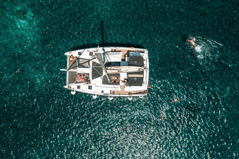 Santorini: Majestic Catamaran Cruise with Meal and Drinks - What Sets This Tour Apart?