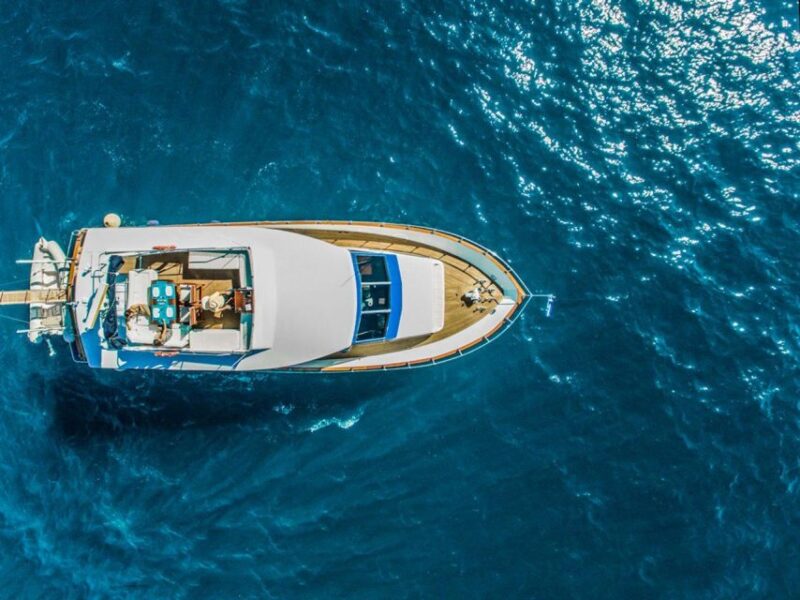 Santorini: Motor Yacht Sunset Cruise With 5-Course Dinner - Exclusive Dining Experience