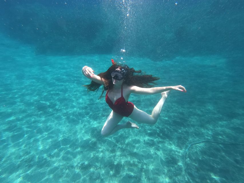Santorini: Sea Caves Kayak Trip with Snorkeling and Picnic - The Experience in Detail
