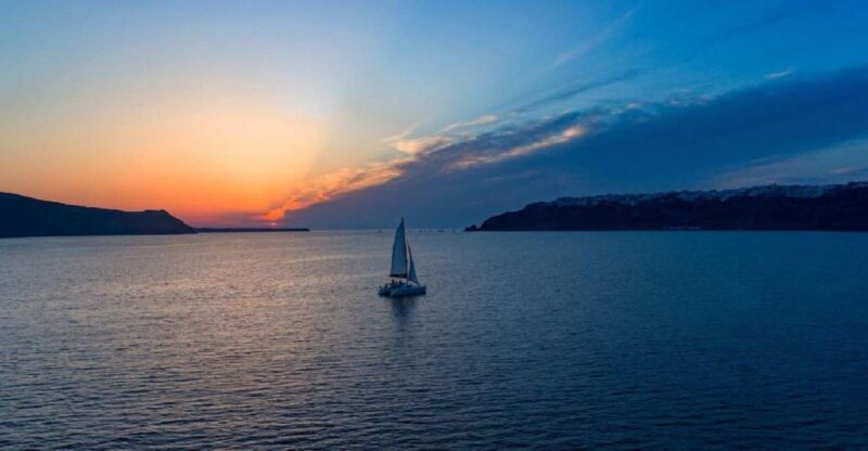 Santorini: Sunset Cruise With Swim Stops, Dinner, and Drinks - Pricing and Inclusions