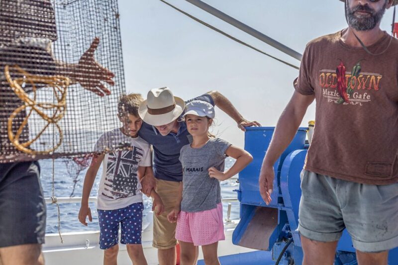 Santorini: Traditional Fishing Trip and Fresh Fish Lunch - Boat and Safety Features