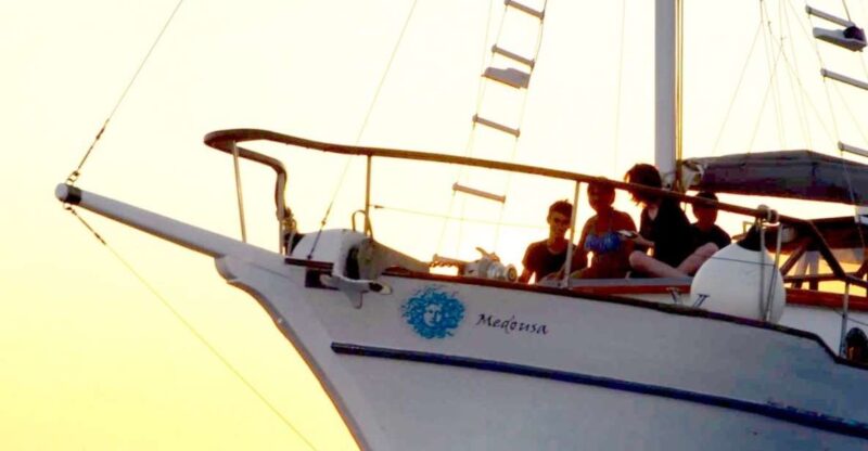 Santorini: Traditional Wooden Boat Tour With Meal and Wine - Recommended Attire