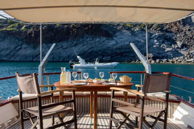 Santorini: Traditional Wooden Boat Tour With Meal and Wine - Tour Policies