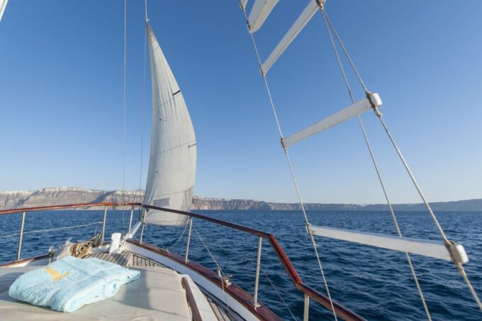 Santorini: Traditional Wooden Boat Tour With Meal and Wine - Frequently Asked Questions