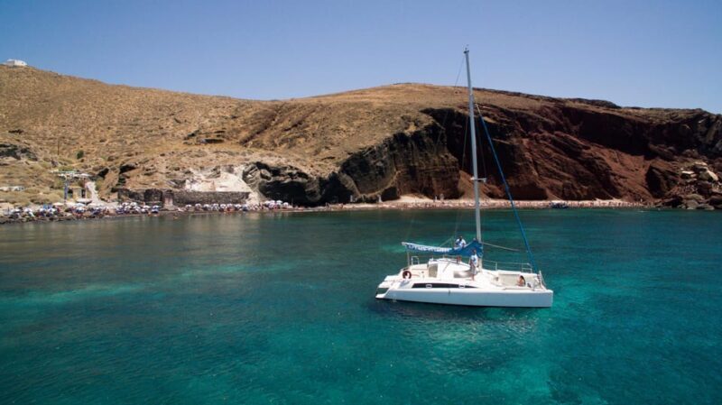 Santorini:Catamaran: private cruise with food & drinks - Who Should Consider This Tour?