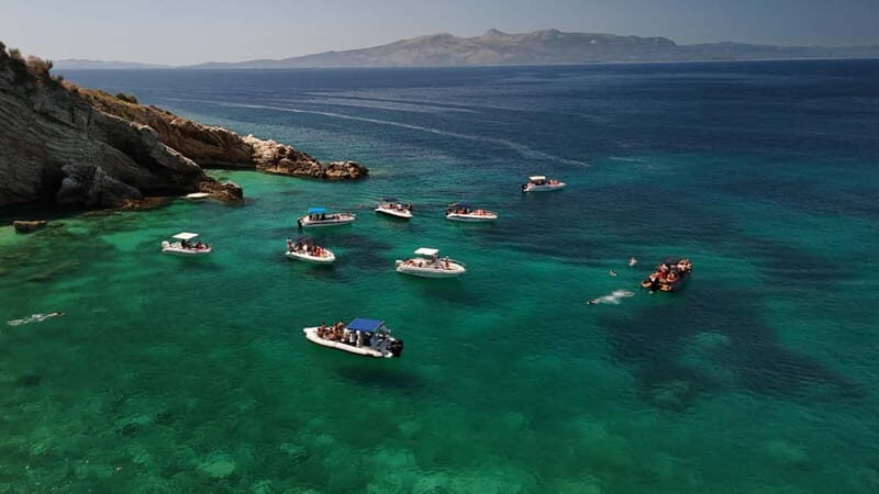 Saranda: Boat Trip to 6 Stops + Free Drink & Free Umbrellas - Key Points