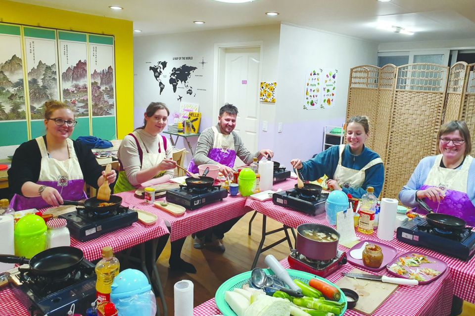 Seoul: Korean Cooking Class at a Local Home and Market Tour - Preparing Korean Main Dishes