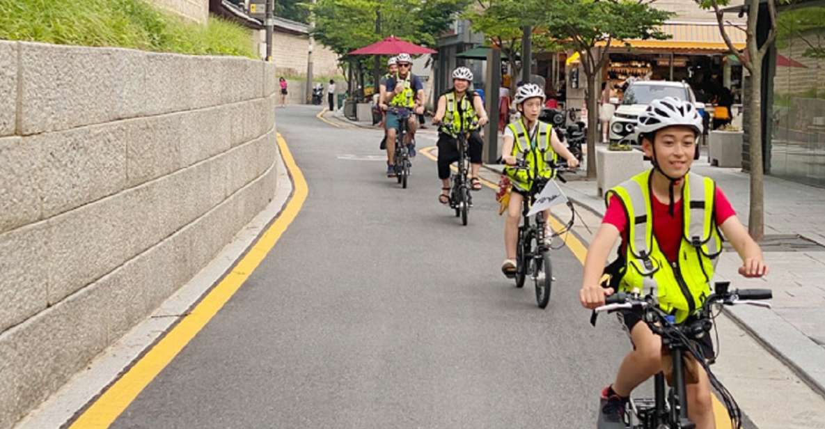 Seoul: Market Food Tour & Evening Ebike Ride - Historic Landmarks