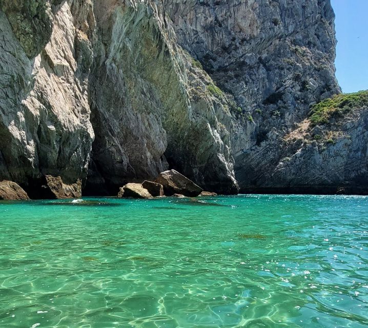 Sesimbra: Secret Bays and Beaches Boat Tour With Snorkeling - Experiencing the Praia Da Mijona