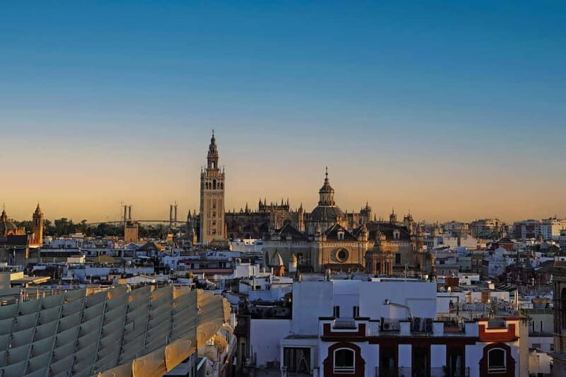 Seville: Cathedral and Giralda Guided Tour with Tapas - Key Points
