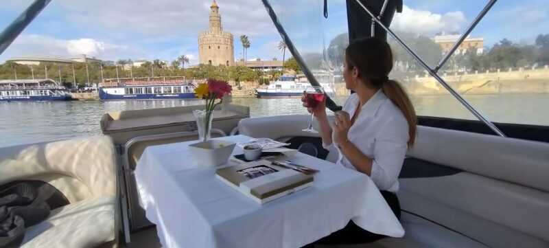 Seville: Exclusive River Boat Tour with Tapas - Authenticity and Comfort