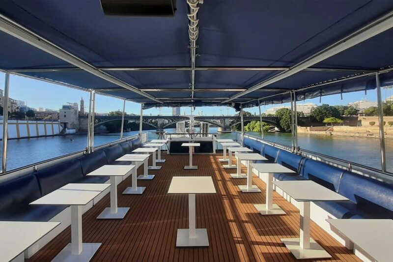 Seville: Restaurant Boat Ride on the Guadalquivir River With Lunch/Dinner - Scenic Highlights