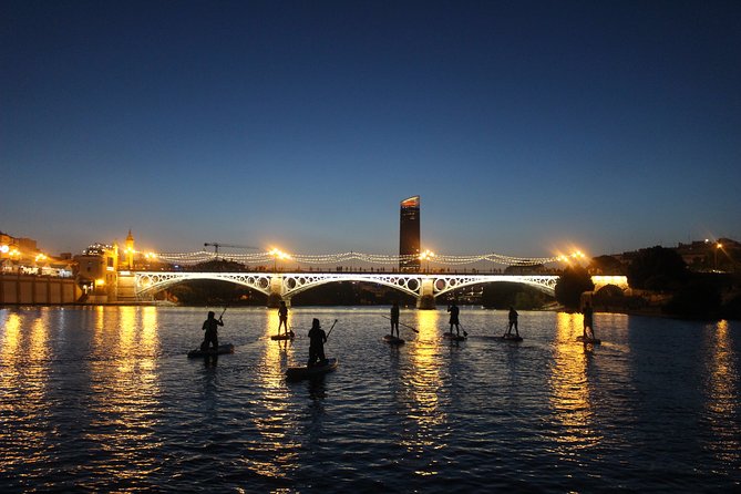Seville: Sunset in Paddle Surf - Cancellation Policy