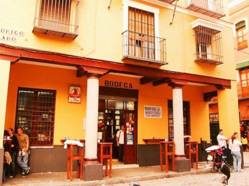 Seville: Tapas Tour With Wine and Rooftop Drinks - Exploring Sevilles Culinary Traditions