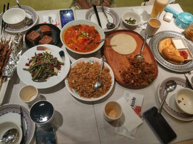 Shanghai: Night River Cruise Tour With Xinjiang Style Dining - Frequently Asked Questions
