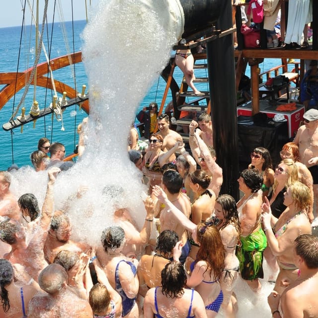 Side: Dolphin Boat Tour With Lunch Foam party Swimming - An In-Depth Look at the Experience