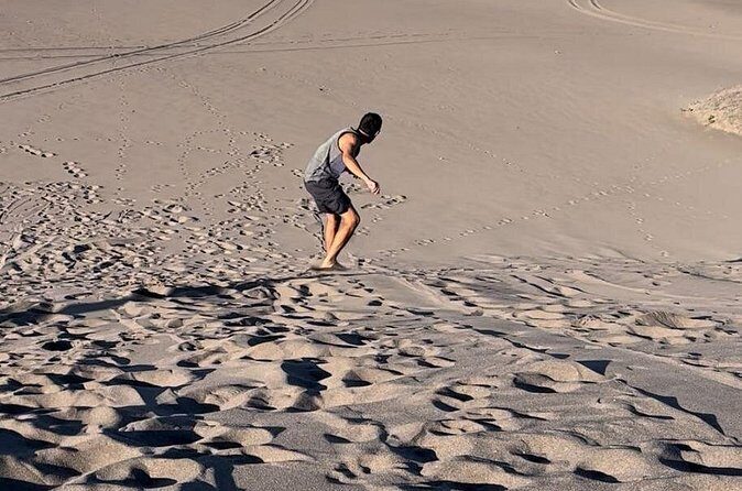 Slide into the sunset by Sandboarding in Las Dunas Del Mogote - Who Would Love This Tour?