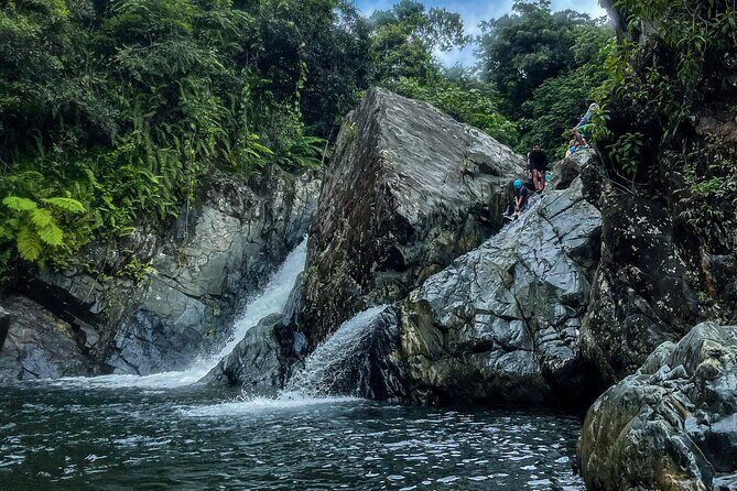 Small Group El Yunque Half Day Tour with Transport: Waterslide - The Sum Up