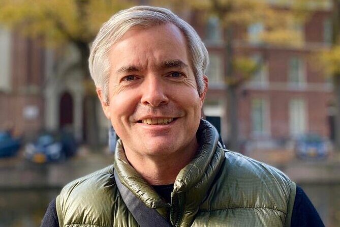Small Group Walking Tour in Amsterdam with Friendly and Fun Guide - Old Center and Historic Stories