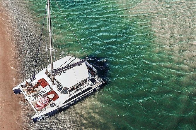 Snorkel adventure to Isla Mujeres by Catamaran. Open Bar and buffet included. - Returning to Cancun