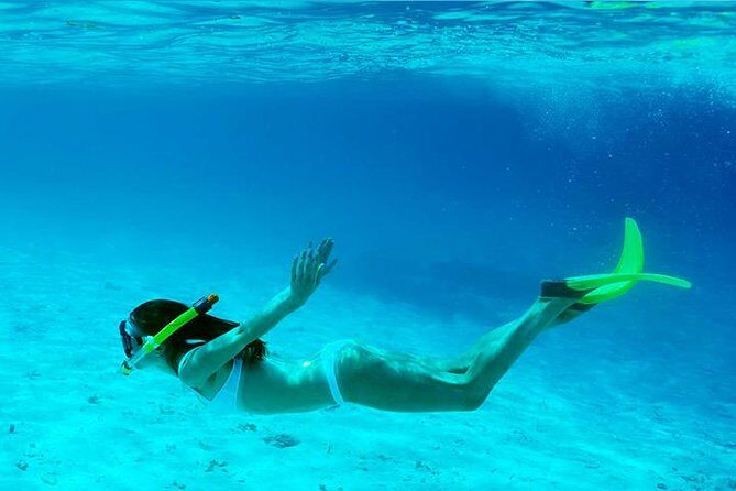 Snorkeling & Kayacking Day Trip Royal Garrafon Park Bassic Classic - Practical Details: What You Need to Know