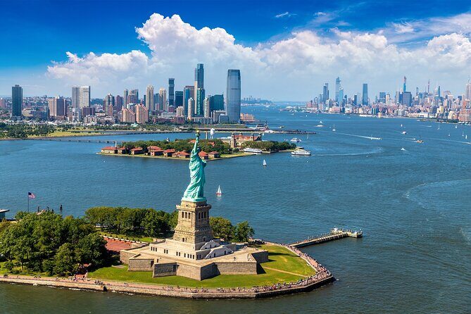 Statue of Liberty and Ellis Island Ferry with Audio Tour Access - Walking Through the Itinerary