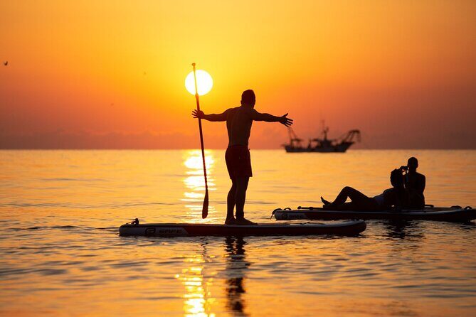 Sunrise in a Stand-up Paddle with Breakfast on board - Additional Activities: Coastal Exploration and Water Jump