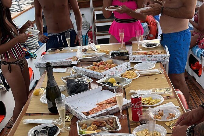 Sunset aperitif on a boat in Scilla - The Itinerary in Detail