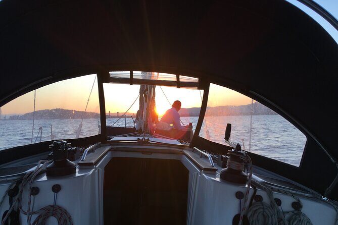 Sunset boat trip with open bar of cava (local champagne) - The Sum Up