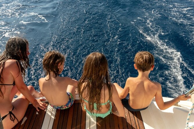 Sunset Catamaran Cruise Dia Island With Premium Menu - Local Dinner Prepared by Crew