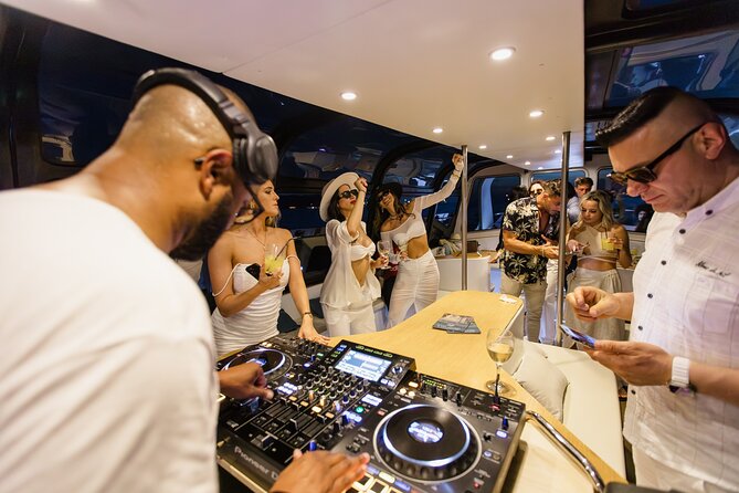 Sunset DJ Boat Party Cruise With Open Bar - Meeting Point and Logistics