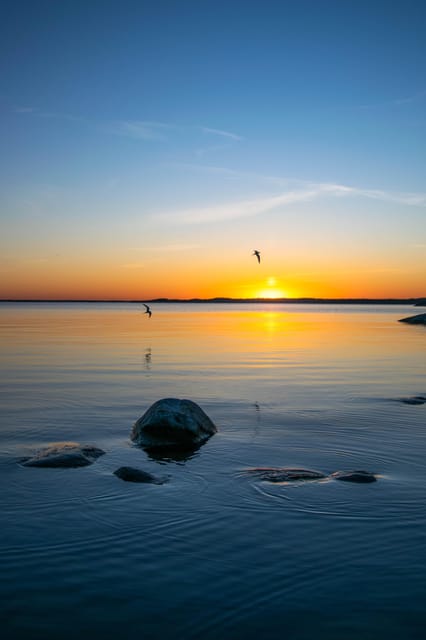 Sunset in the archipelago from Helsinki - Key Points