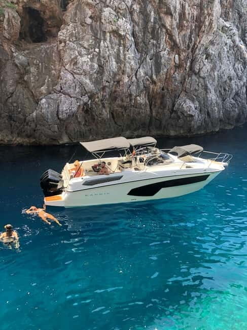 Sunset Private Boat Trip to Marine Reserve Mallorca - The Sum Up
