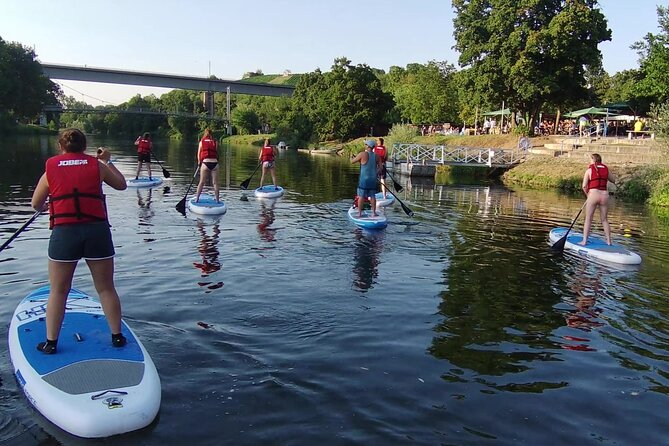 SUP SUNDOWNER MOONSHINE TOUR Stand up Paddling Marbach Am Neckar - Sipping the Complimentary Schnapps