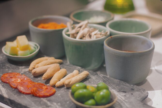 Taste of Spain: Tapas Cooking Class With Bottomless Wine Pairing - Meeting Point and Dietary Accommodations