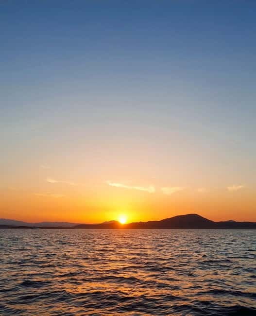 Tavolara: Sunset Aperitif Tour with Drinks and local snacks - What Youll Experience