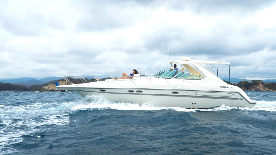 The Crucecita: Private Yacht Cruise in Huatulco With Drinks - Relaxing Sunbathing on Deck