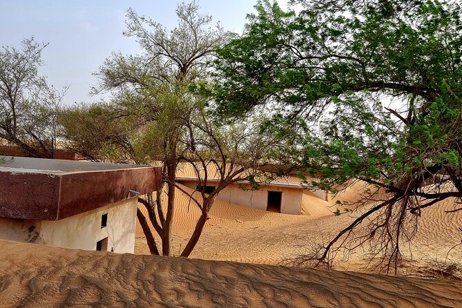 The Ghost Village Safari Tour With Dune Bashing and Sandboarding - Tips for Participants