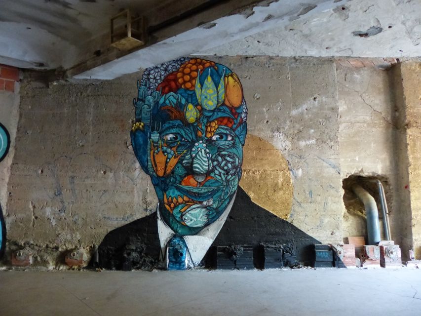 The Real Lisbon Street Art Tour by Minivan - A Guide to Lisbons Artistic Landscape