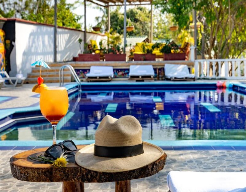 Tierra Bomba: Day Tour in a Beach Club With Pool in Punta Arena - Key Points