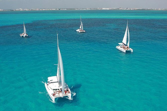 Top Tour Sail To Isla Mujeres By Catamaran Buffet And Drinks Included - Detailed Breakdown of the Experience