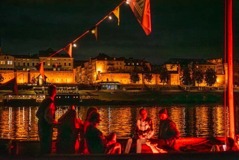 Toru: Toru at Night from a Boat on the Vistula - Practical Details and Tips for Travelers  